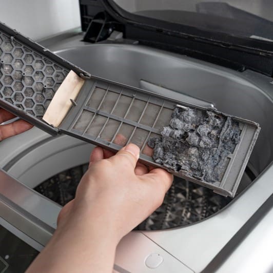 Why You Need To Clean Your Washing Machine Filter ASAP